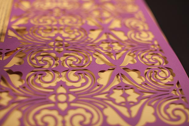 A laser paper-cut wedding certificate with custom printed layer